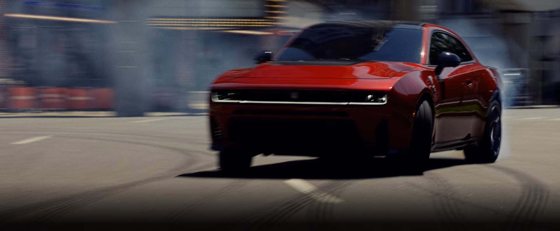2026 Dodge Charger driving fast