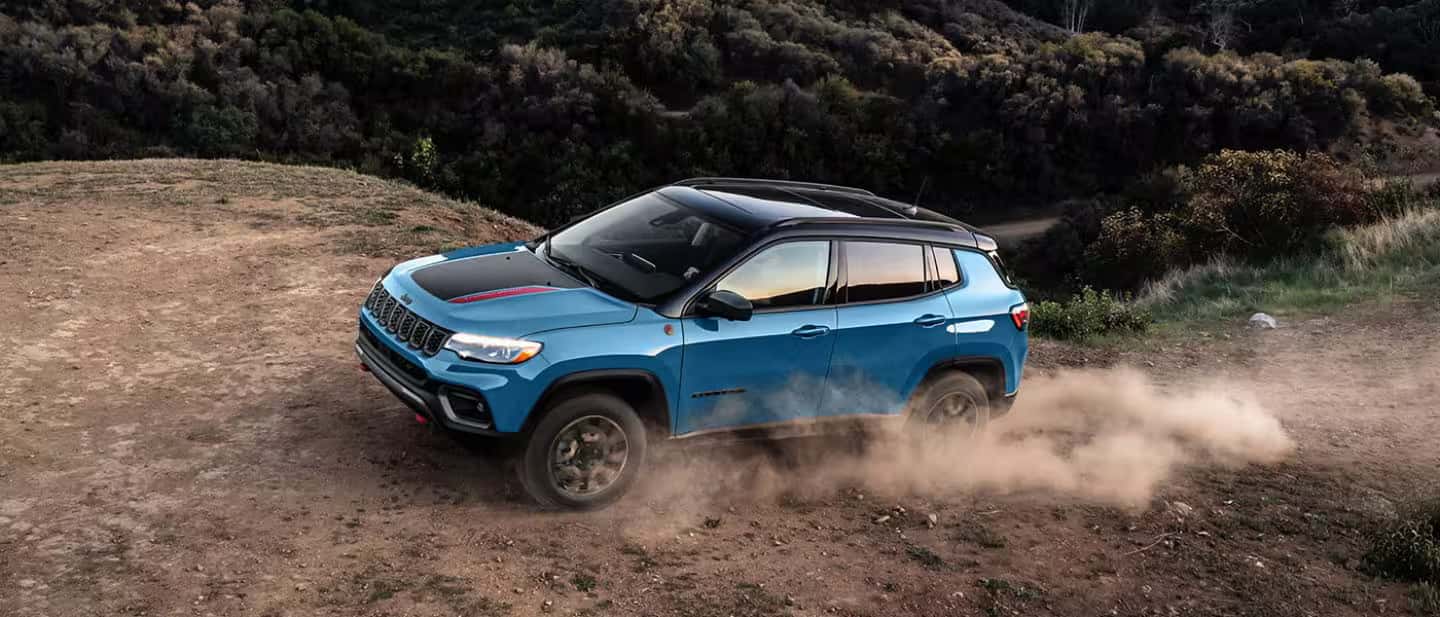 2026 Jeep Compass driving in the desert