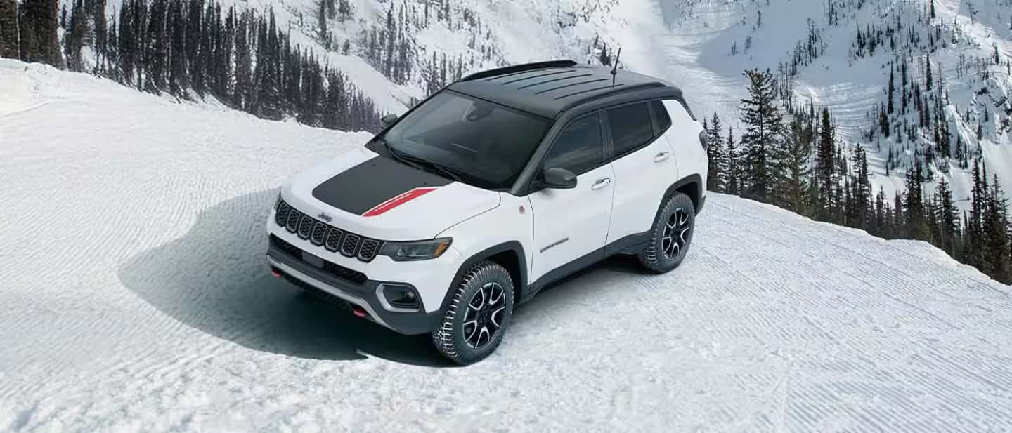 2026 Jeep Compass driving in the snow