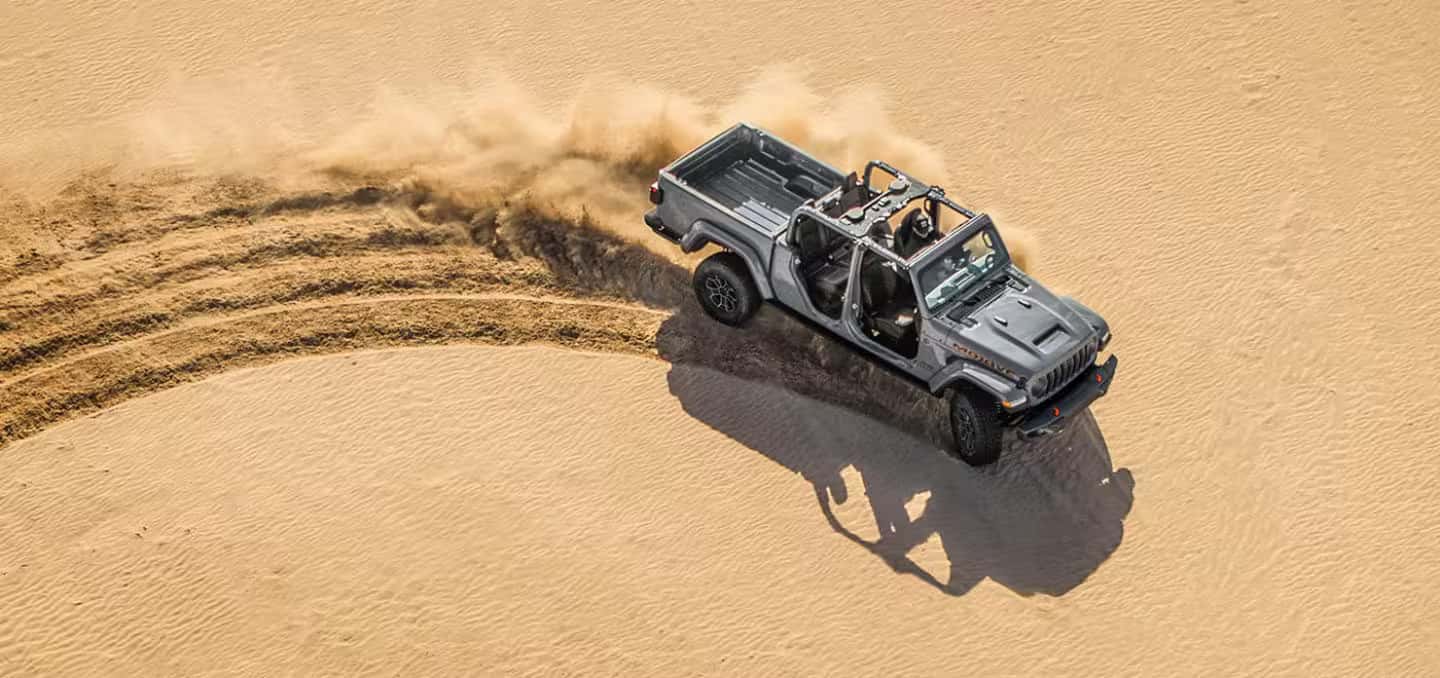 2026 Jeep Gladiator driving in the desert