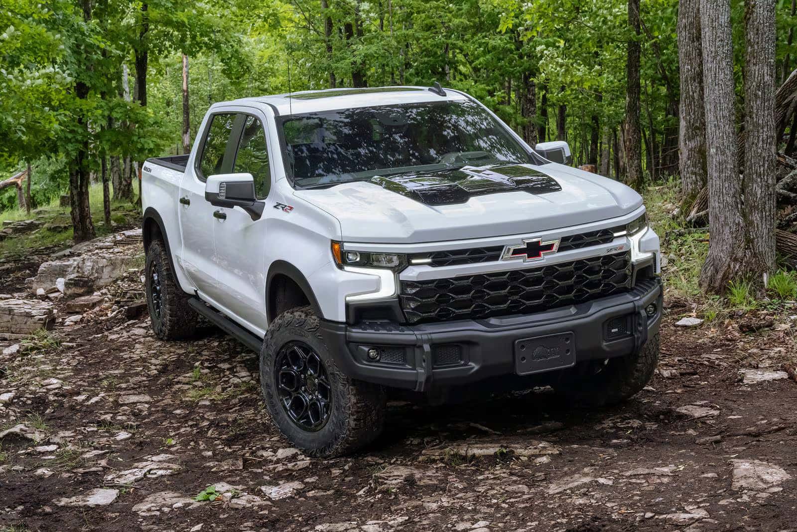 2026 Chevy Silverado 1500 driving in a creek