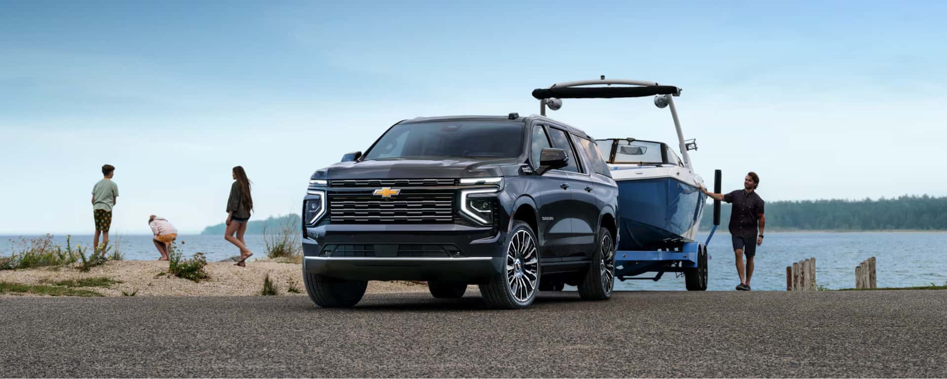 2026 Chevy Suburban pulling a trailer