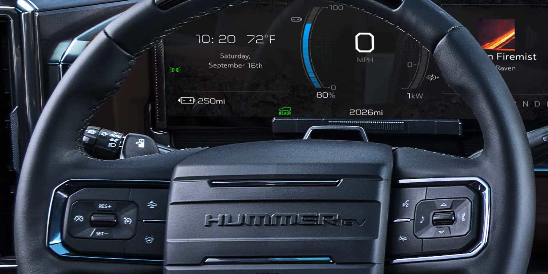Interior view of the steering wheel and infotainment system in the new 2026 Hummer EV SUV