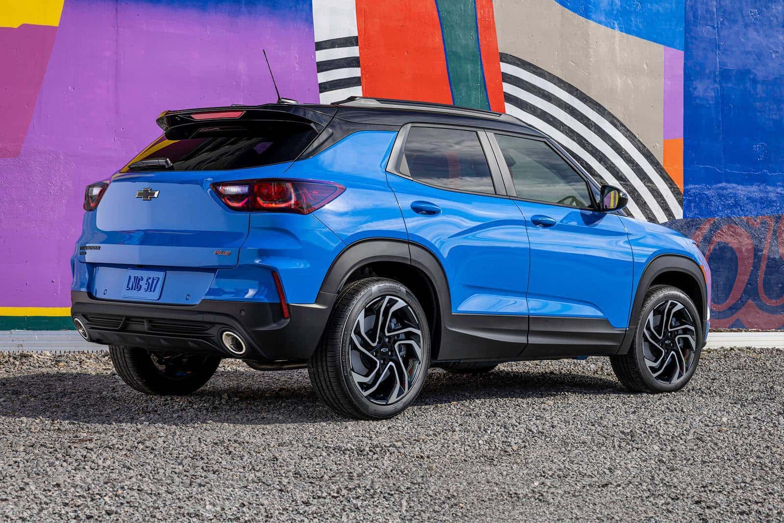 2026 Chevy Trailblazer parked on a gravel road next to a colored wall