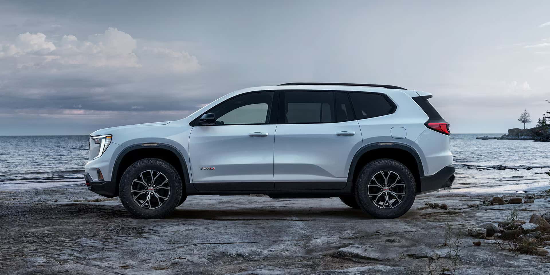 2026 GMC Acadia parked on a beach