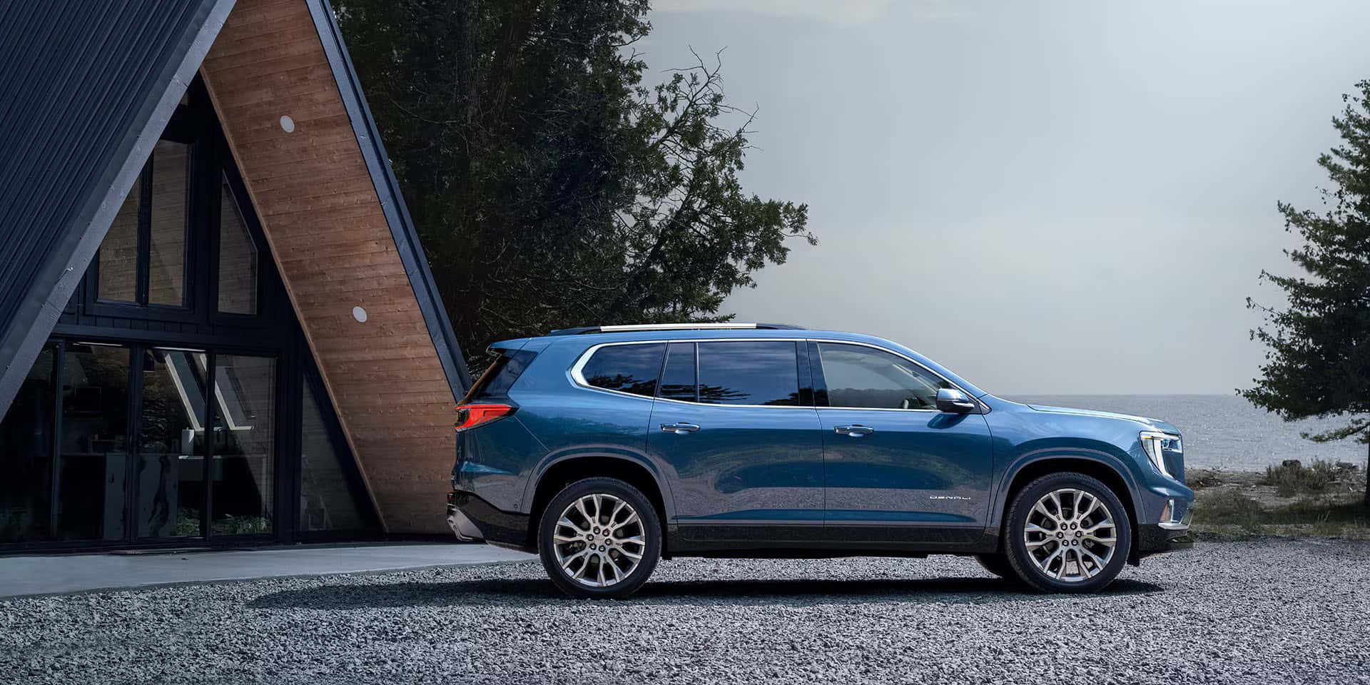 2026 GMC Acadia parked outside a home