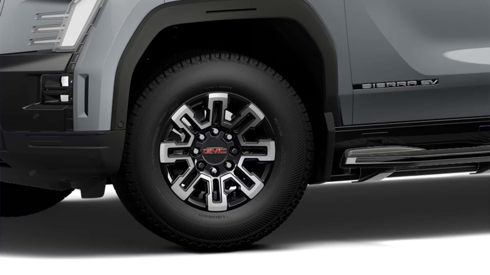 a view of the wheels and tire of the 2026 Sierra EV