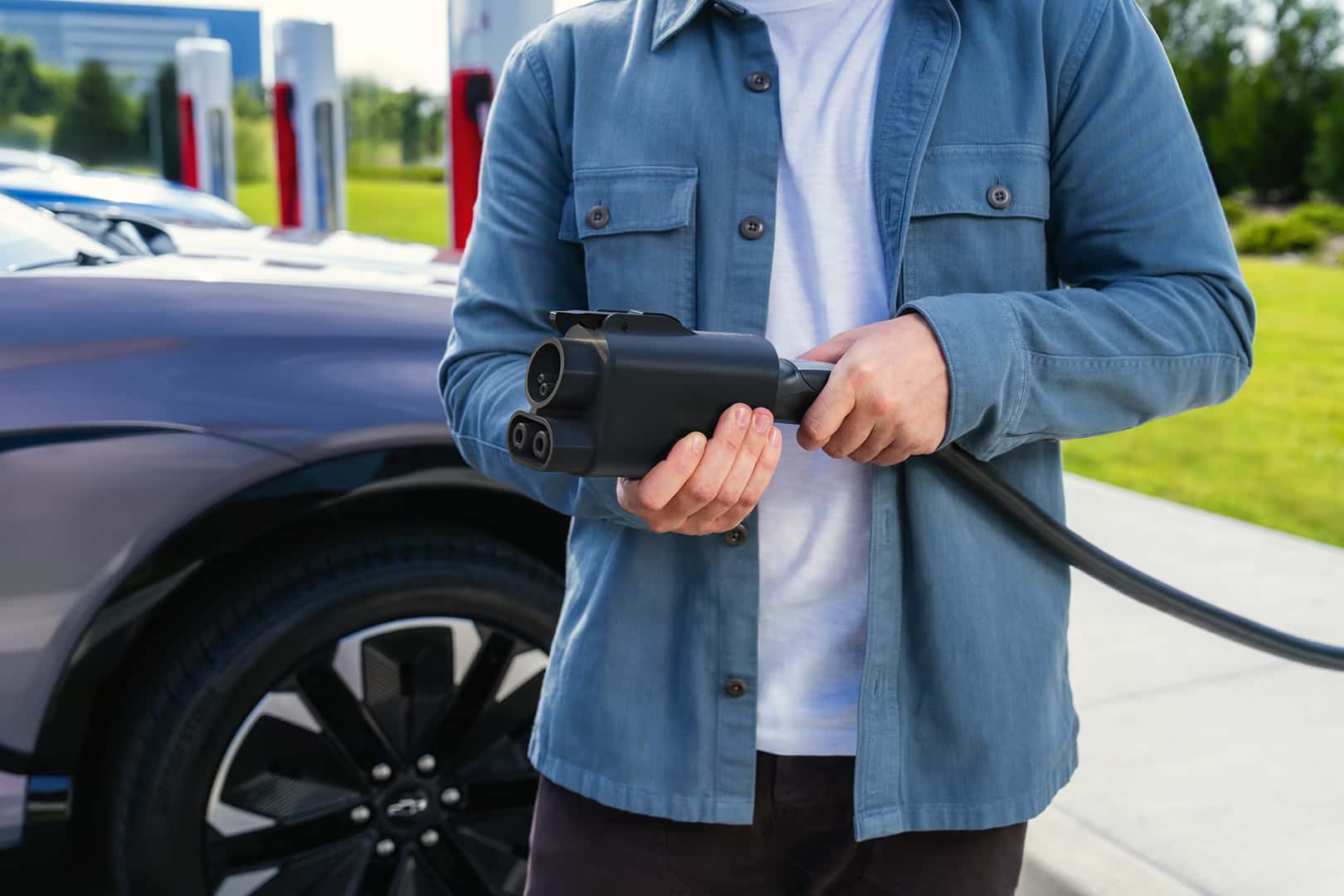 a man holding a charger