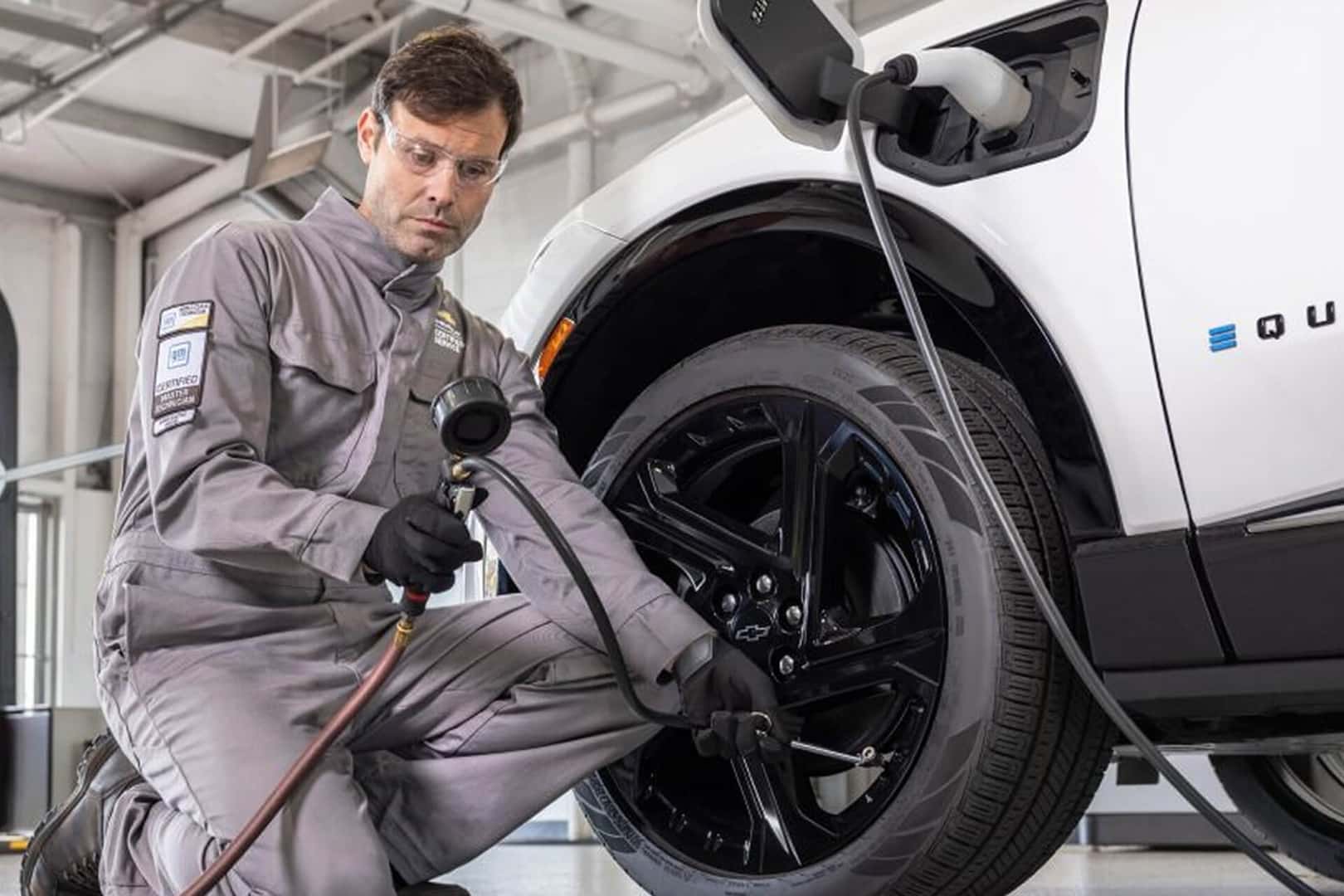 white equinox being serviced by tech
