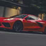 2026 Chevy Corvette Stingray racing down the street