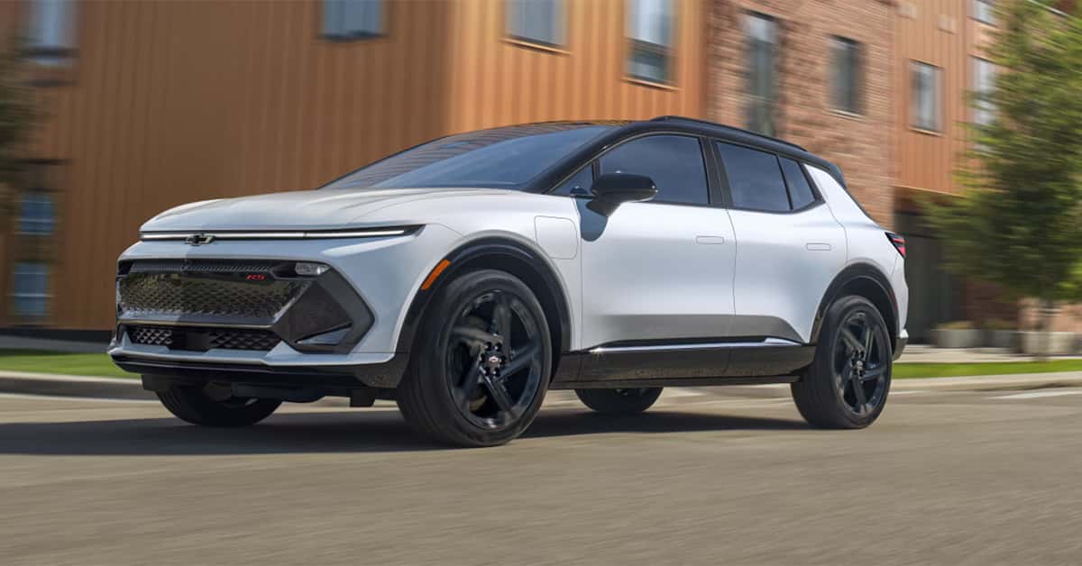 2026 Chevy Equinox EV driving in the street