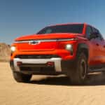 2026 Chevy Silverado EV driving in the desert