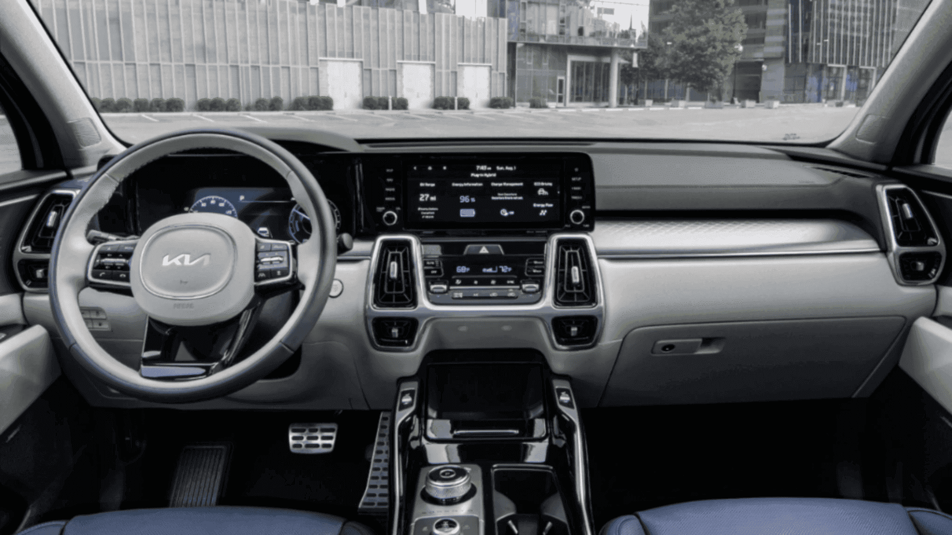 Driver's cockpit of the 2024 Kia Sorento Plug-In Hybrid with dual digital displays