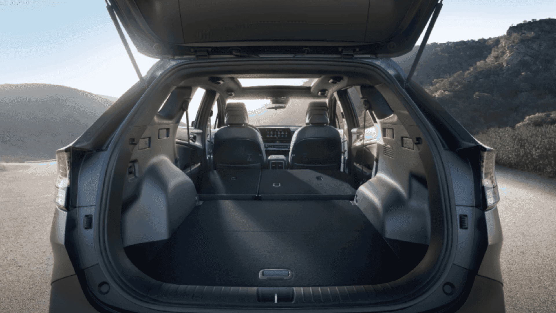 Open cargo space in a Kia Sportage with folded rear seats