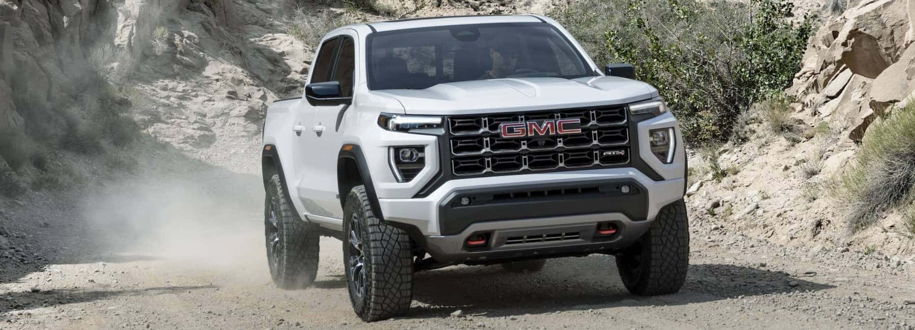 2023-GMC-Canyon-driving-down-gravel-road
