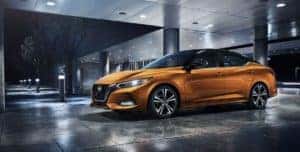 Orange 2023 Nissan Sentra parked