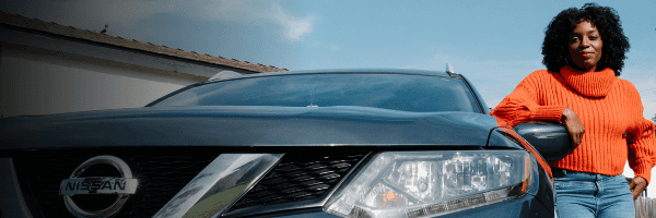 Woman with Certified Pre-Owned Nissan in Lafayette Indiana