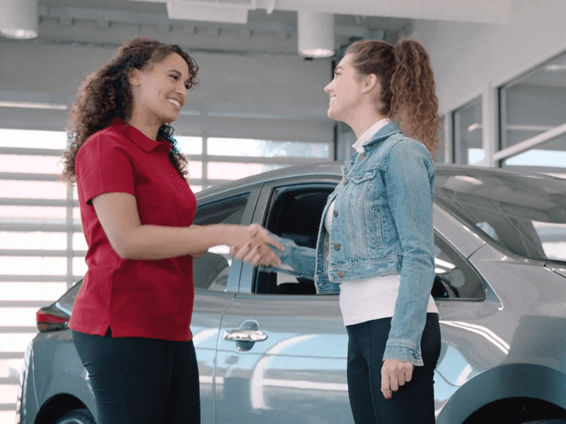 Nissan service advisor and customer