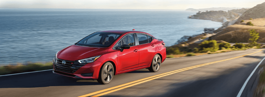 2025 Nissan Versa Ownership Guide 2025 Nissan Versa driving on the road