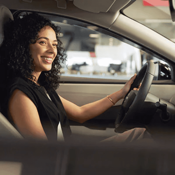 Schedule Nissan Service in Lafayette Indiana Customer speaking with a Nissan service advisor in Lafayette Indiana