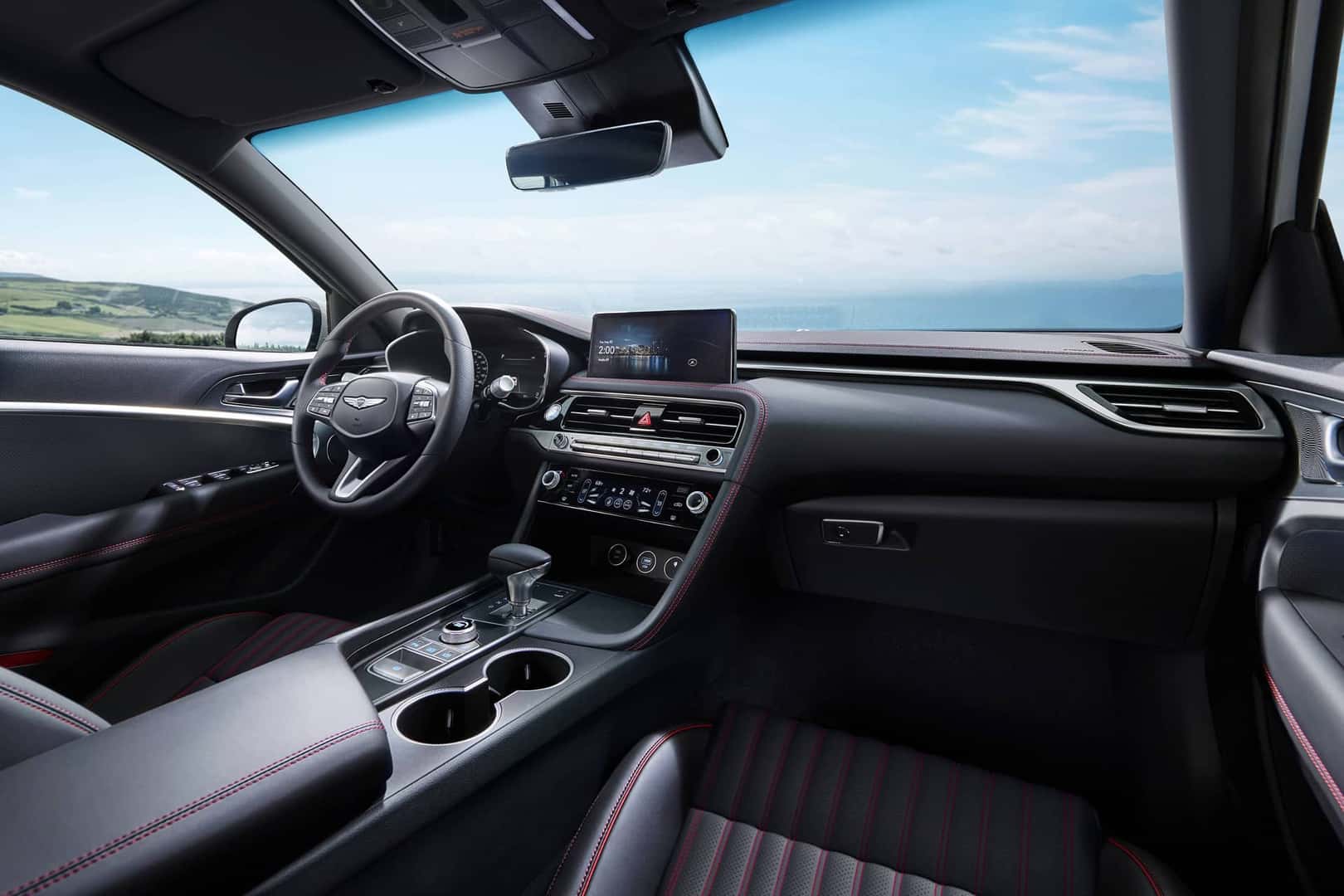 genesis 2026 g70 interior parked in front of ocean