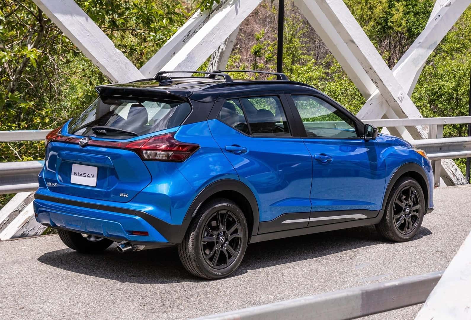 The Exceptional Back Exterior Of The 2024 Nissan Kicks, On A Sturdy Bridge