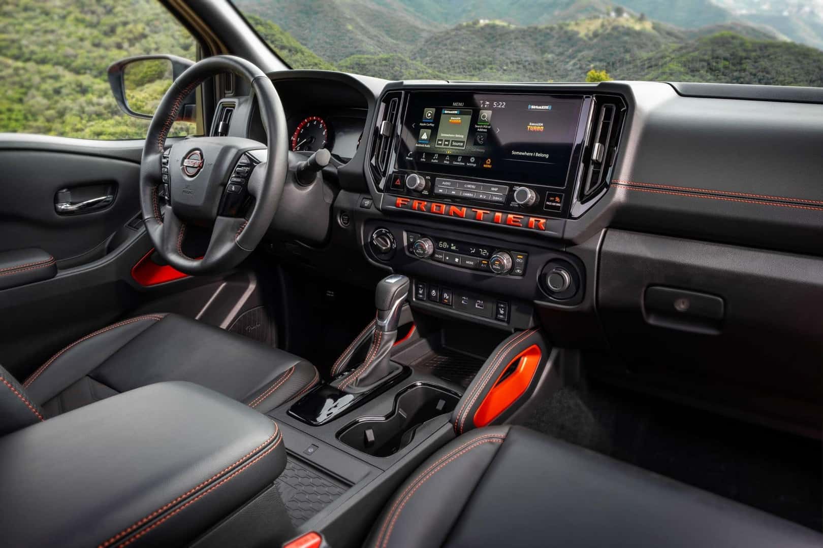 The Outstanding Front Interior Of The Fantabulous 2025 Nissan Frontier
