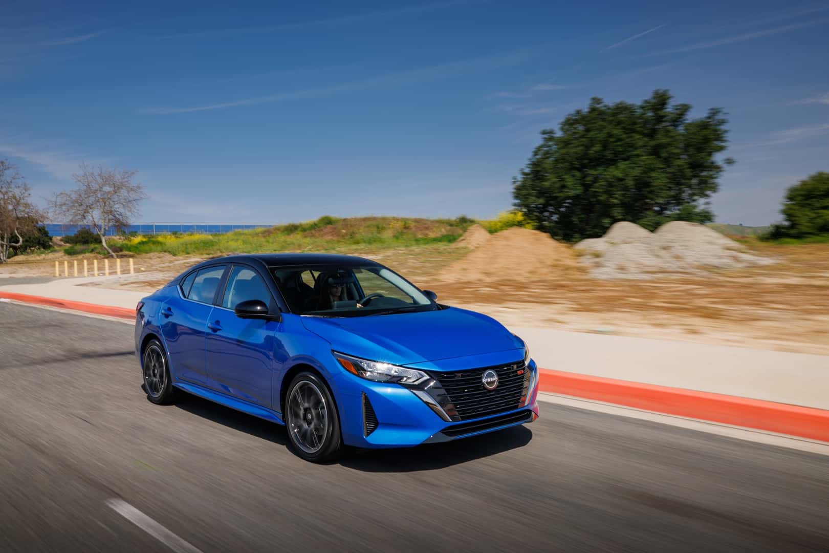 2025 Nissan Sentra Front Side View on the Road
