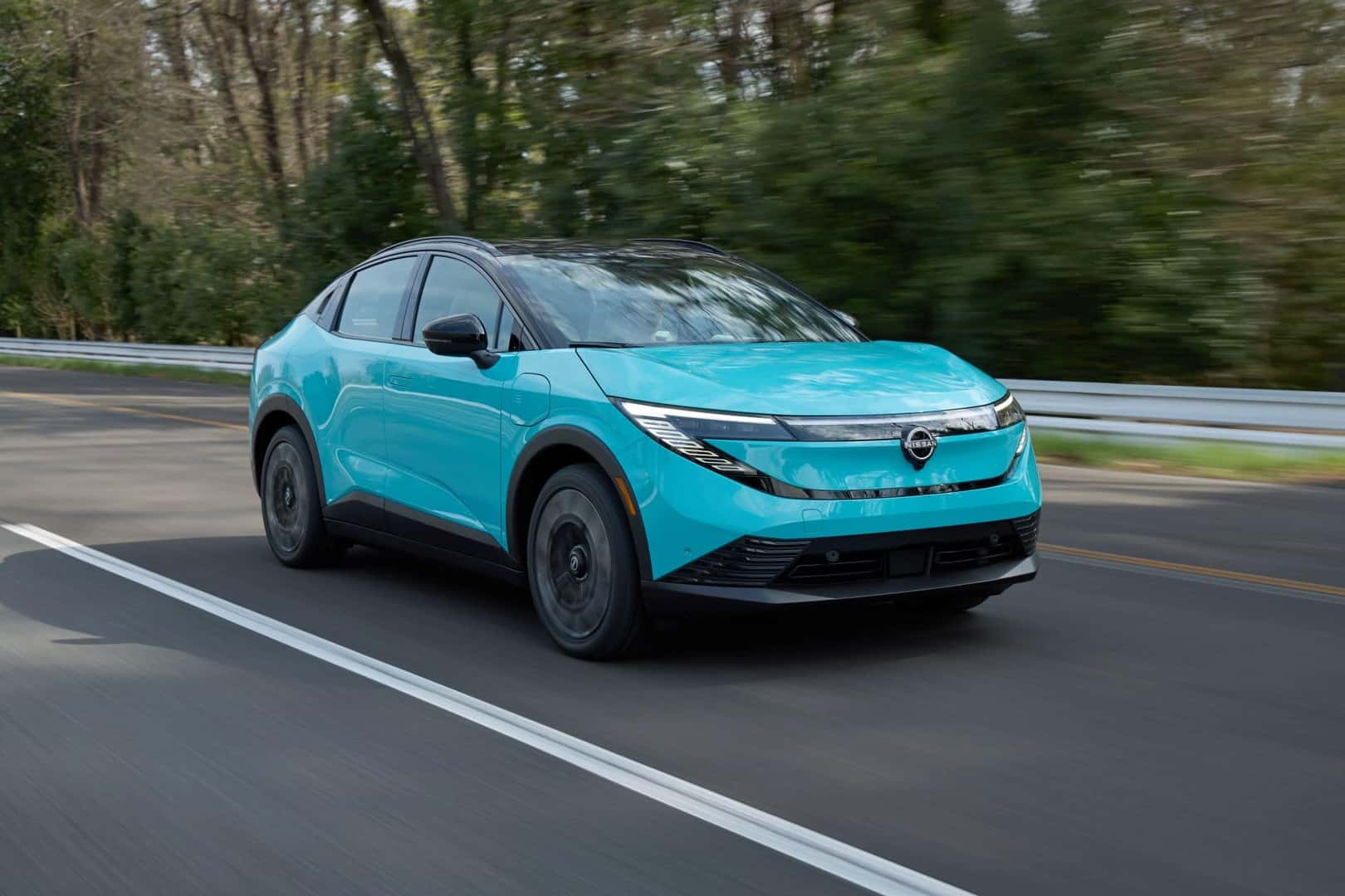 The Beautiful Blue Exterior Of The Fast And Flexible Nissan Leaf