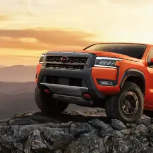 2026 Nissan Frontier PRO-4X Afterburn Orange on mountain