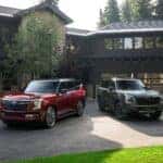 The Spectacular Lineup Of The Nissan Armada, Outside A Fabulous And Extensive Mansion