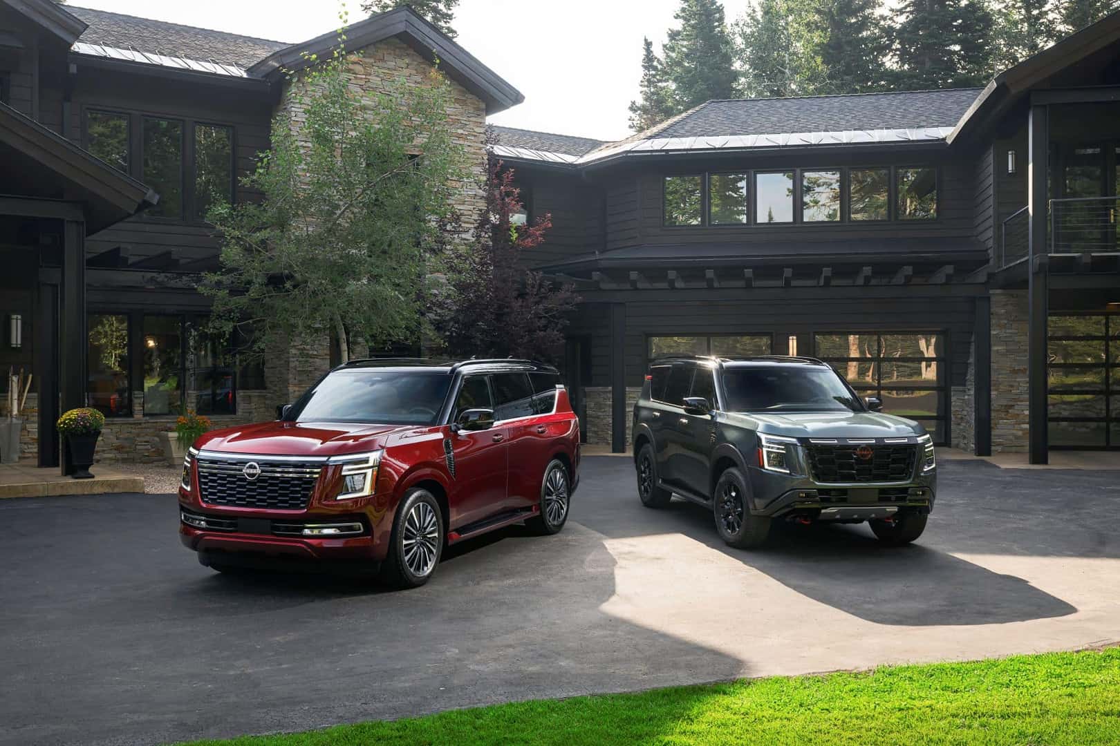 The Spectacular Lineup Of The Nissan Armada, Outside A Fabulous And Extensive Mansion