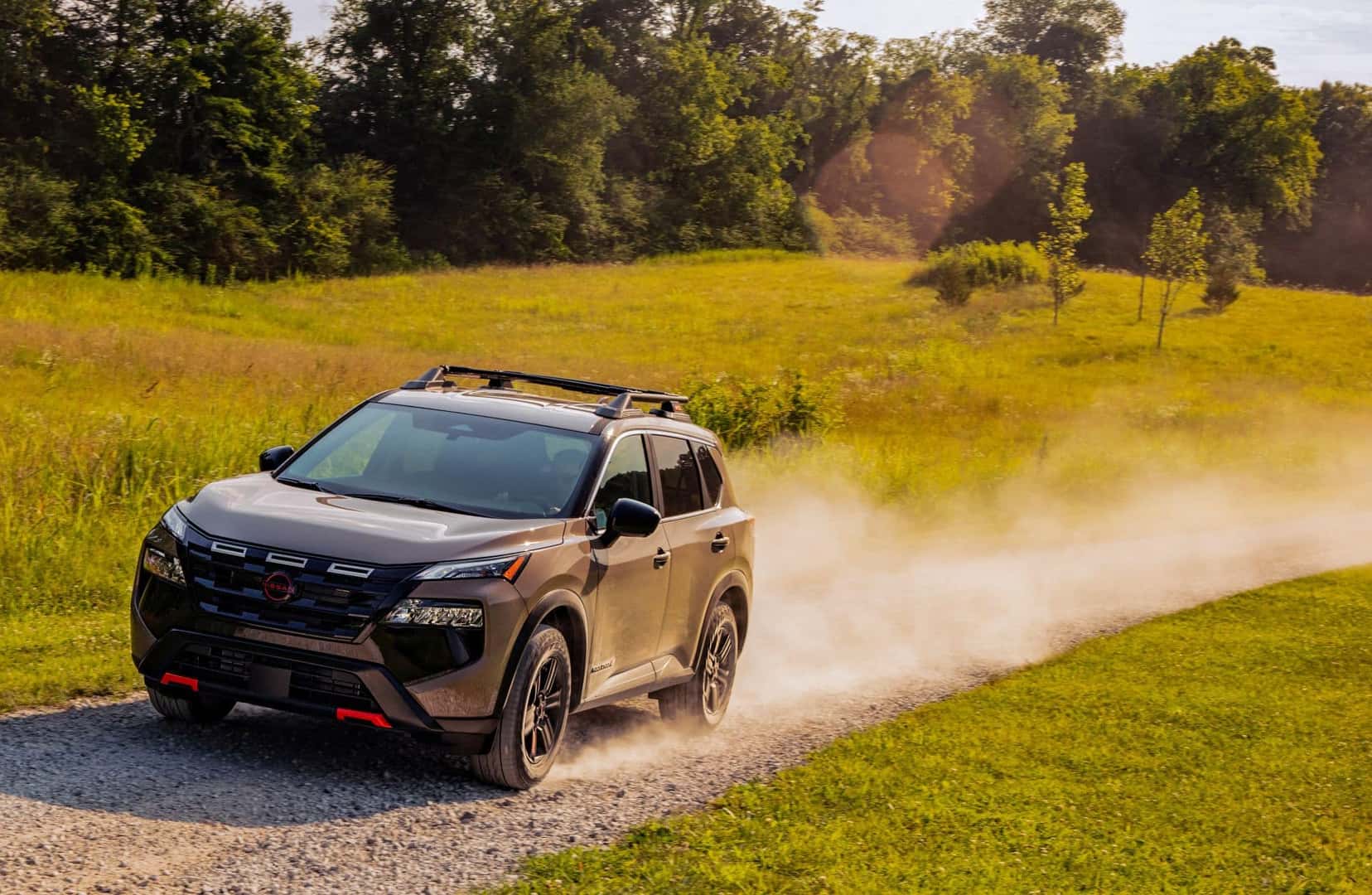 The Zooming 2025 Nissan Rogue, Brushing Dust As It Cross The Path