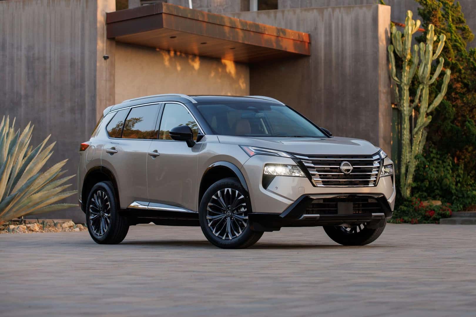 The Fabulous And Rebellious 2024 Nissan Rogue Parked Outside A Family House