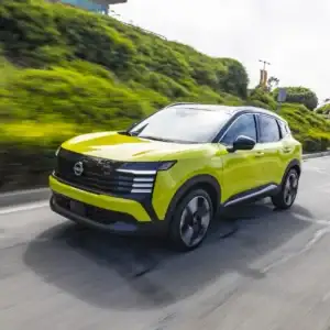 2026 Nissan Kicks on the Road in Motion Front View