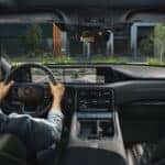 A Nissan Driver Using The Invisible Hood View Technology To Safely Park
