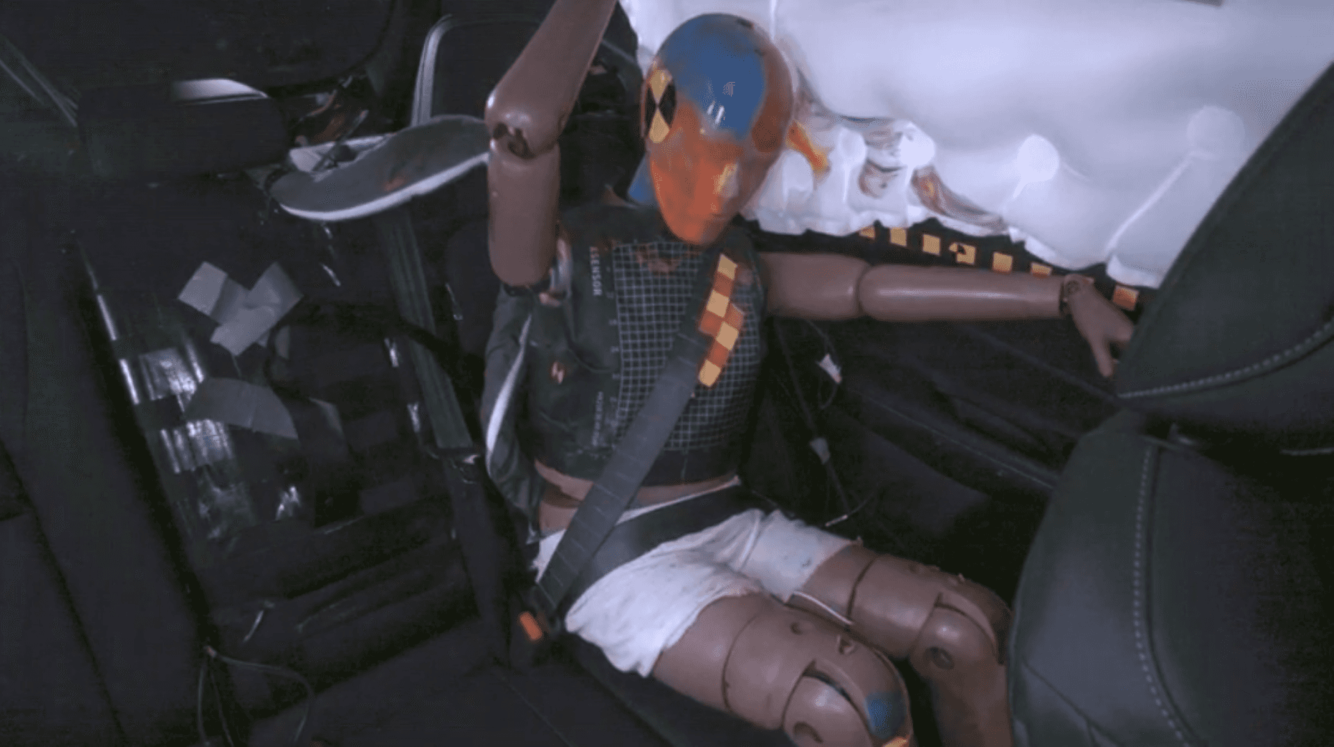 Crash Test Dummy Backseat View During Impact