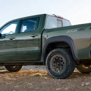 2026 Nissan Frontier PRO-4X Tactical Green Metallic on rough terrain