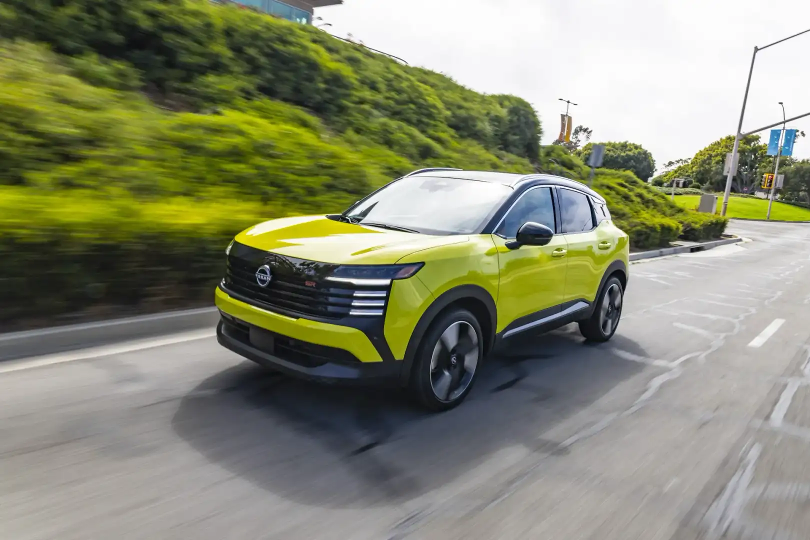 2026 Nissan Kicks on the Road in Motion Front View