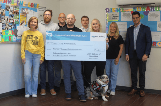 Diehl Auto Presenting SCHS With Fundraising Check