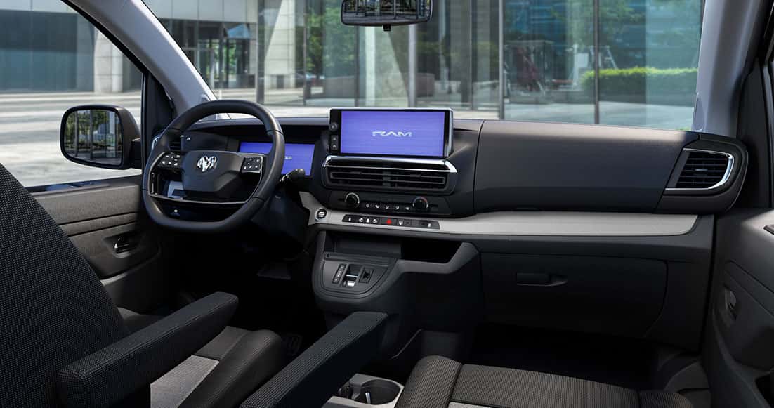 2027 Ram ProMaster City interior cab showing the seats, touchscreen and digital instrument cluster
