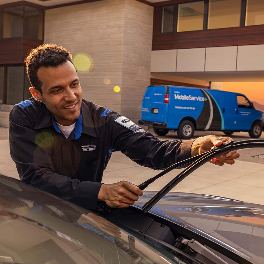 Worker fixing wiper blade