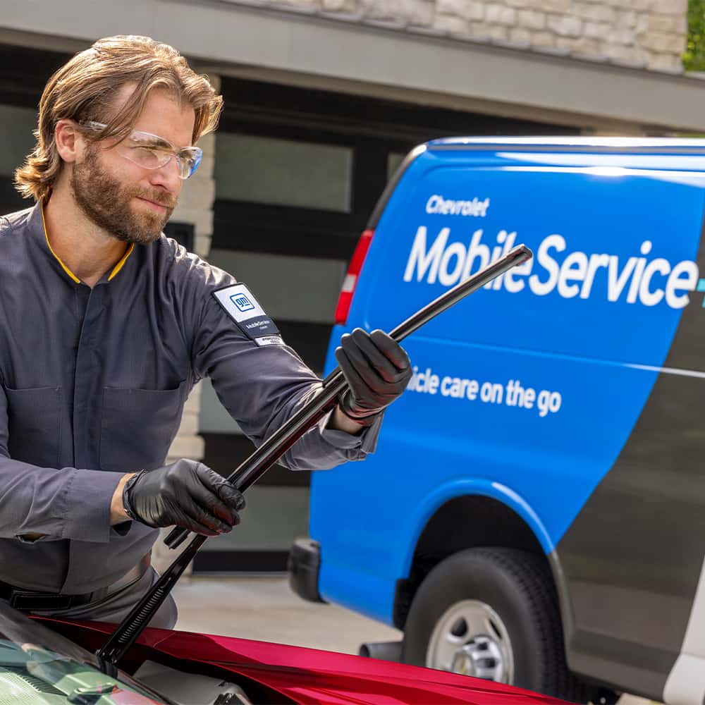 Worker Fixing Wiper Blade