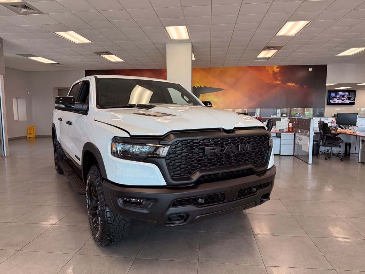 Ram truck in Fayetteville Dodge Ram dealership showroom