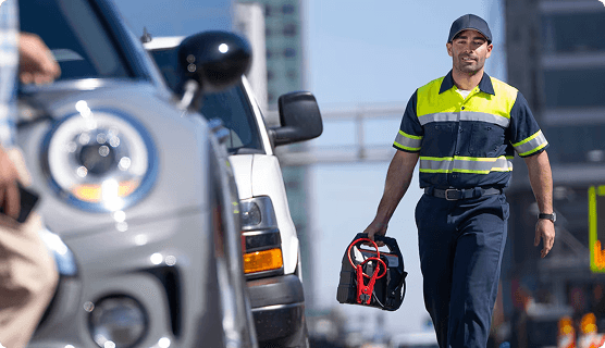 Mechanic carrying battery