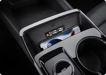 Chevrolet Equinox center console with wireless phone charging pad and cup holders
