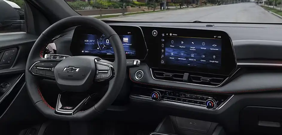 2027 Chevrolet Equinox interior with steering wheel and dual digital displays