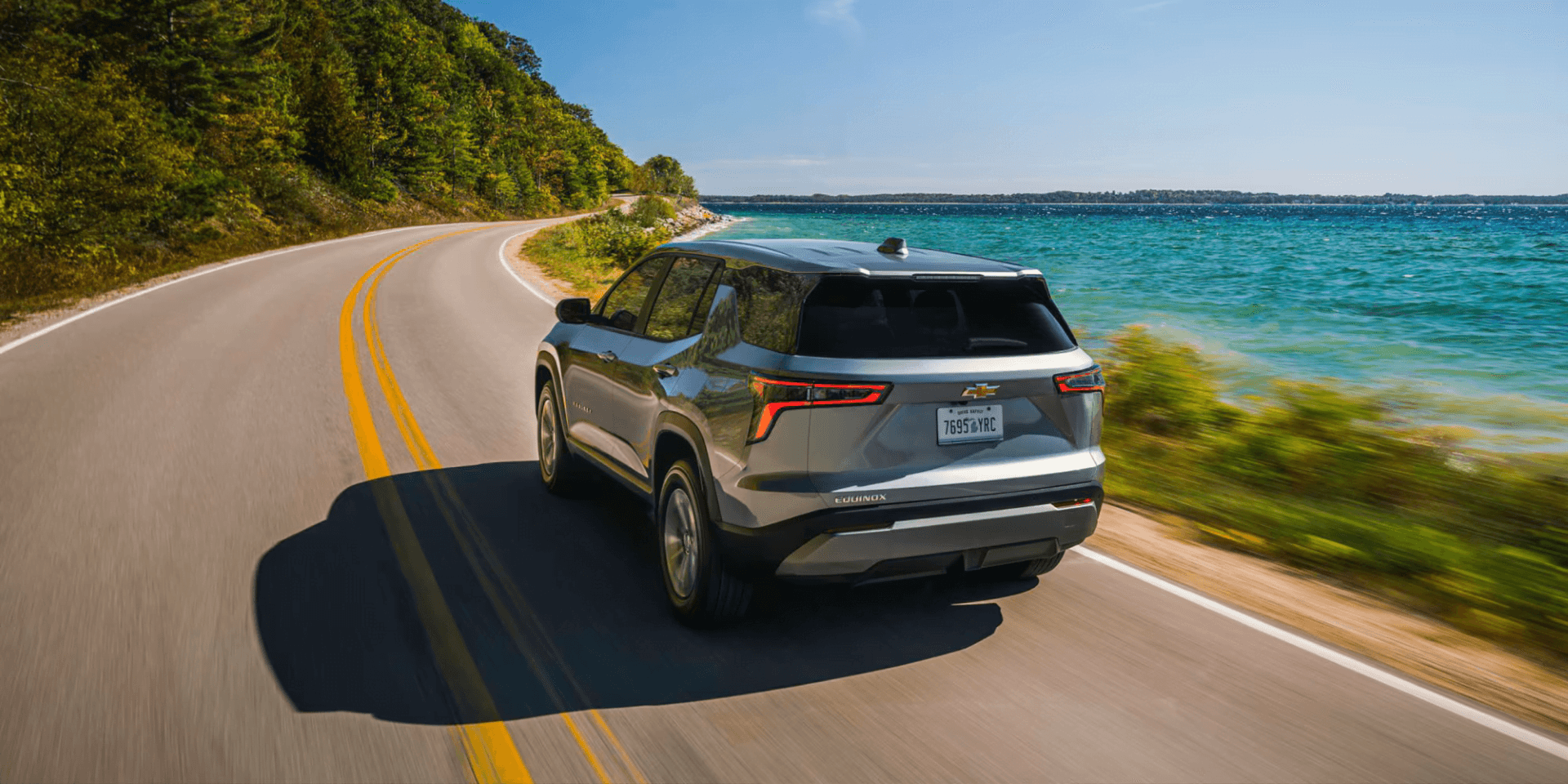 2026 Chevy Equinox driving near the water