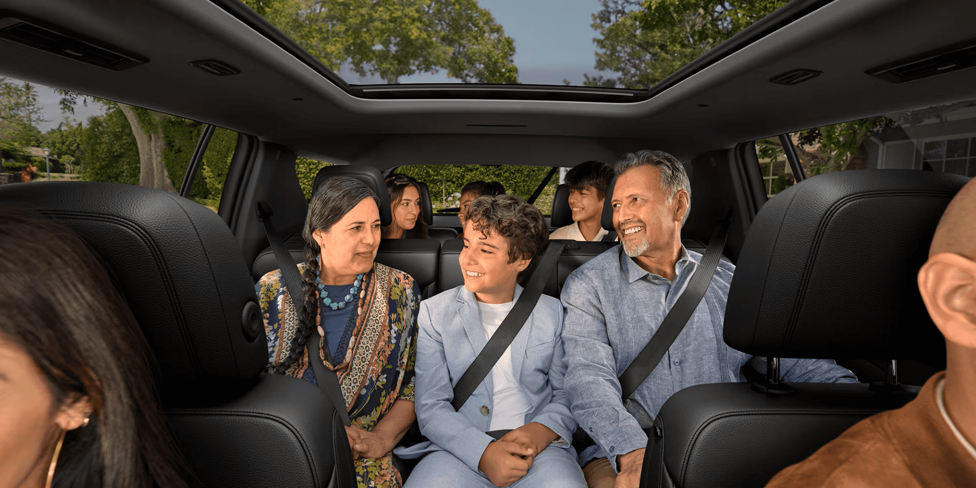 Family members in 2026 Chevy Traverse car interior