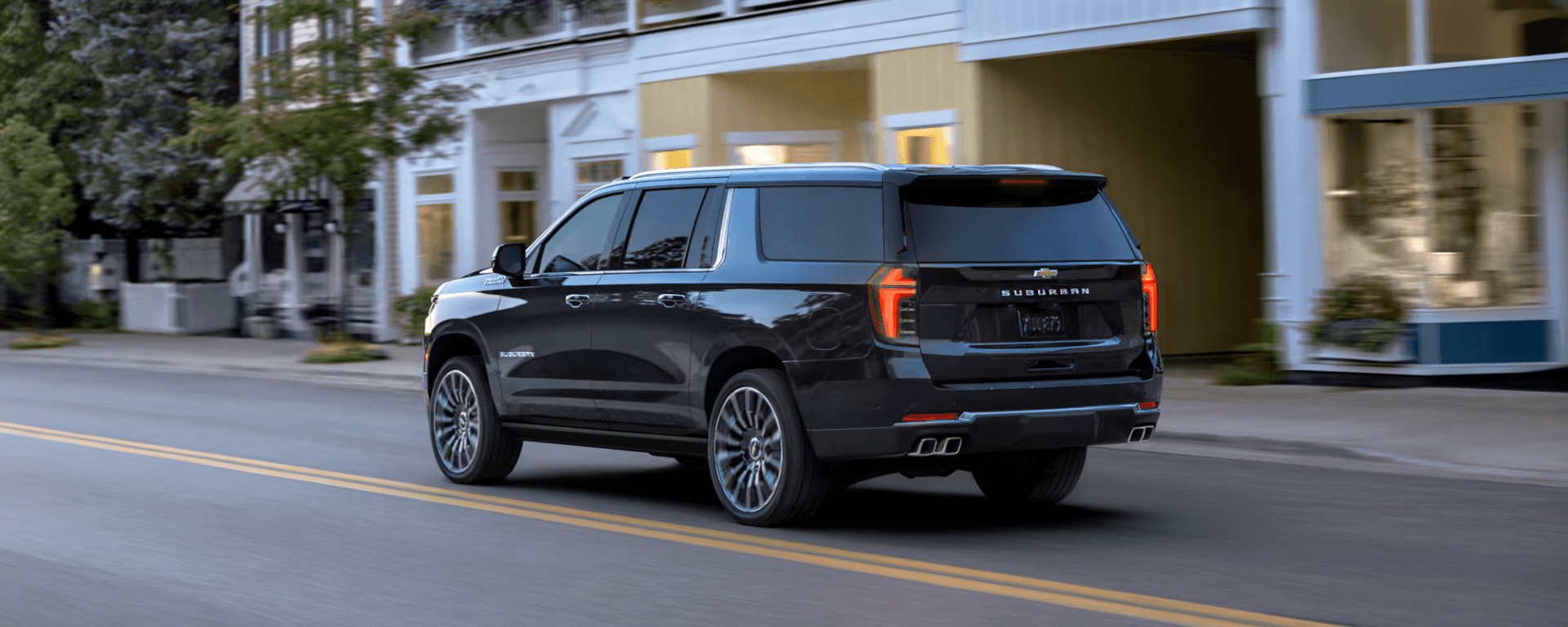 2026 Chevy Suburban driving in the city